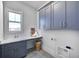 Laundry room with gray cabinets and a white countertop at 16298 Grand Cypress Dr, Noblesville, IN 46060