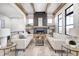 Spacious living room featuring a modern fireplace and comfortable seating at 16298 Grand Cypress Dr, Noblesville, IN 46060