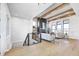 Open living area with hardwood floors and a modern metal railing at 16298 Grand Cypress Dr, Noblesville, IN 46060