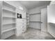 Bright walk-in closet with ample shelving and hanging space at 16298 Grand Cypress Dr, Noblesville, IN 46060
