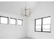 Spacious bedroom with high ceilings, large windows, and a chandelier at 17366 Newton Main St, Westfield, IN 46074