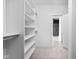 Spacious walk-in closet with built-in shelves at 17366 Newton Main St, Westfield, IN 46074