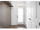 Bright entryway with a glass door and coat hooks at 17366 Newton Main St, Westfield, IN 46074