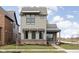 Modern two-story home with gray siding, metal roof, and brick accents at 17366 Newton Main St, Westfield, IN 46074