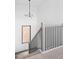 Modern staircase with black spindles and lighting at 17366 Newton Main St, Westfield, IN 46074