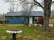 Ranch style home with blue siding, new roof and landscaping at 2625 S Cole St, Indianapolis, IN 46241