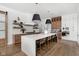 Spacious kitchen with a large island, quartz countertops, and modern appliances at 5187 Abington Way, Zionsville, IN 46077