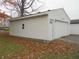 White vinyl sided detached garage with double door at 129 Allen Ln, Greenfield, IN 46140