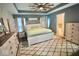 Main bedroom with a large bed, dresser, and ceiling fan at 1874 Explorer Ct, Franklin, IN 46131