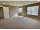 Bright bedroom featuring neutral walls, carpet, and window blinds at 2834 Maricopa Blvd, Whitestown, IN 46075