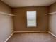 Walk-in closet with wire shelving and a window with blinds at 2834 Maricopa Blvd, Whitestown, IN 46075