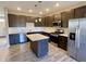 Modern kitchen with stainless steel appliances and an island at 2834 Maricopa Blvd, Whitestown, IN 46075