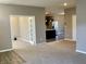Open living room with view into kitchen and access to office at 2834 Maricopa Blvd, Whitestown, IN 46075