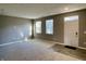 Spacious living room with carpet flooring and large windows at 2834 Maricopa Blvd, Whitestown, IN 46075