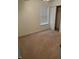 Empty bedroom with a closet and a window at 5283 Tufton Dr, Indianapolis, IN 46254