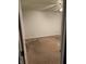Empty carpeted bedroom with a ceiling fan and white walls at 5283 Tufton Dr, Indianapolis, IN 46254