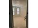 Empty dining room with a light fixture and patterned flooring at 5283 Tufton Dr, Indianapolis, IN 46254
