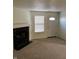 Living Room with a fireplace and neutral colored carpet at 5283 Tufton Dr, Indianapolis, IN 46254