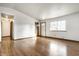 Living room with hardwood floors, vaulted ceiling, and lots of natural light at 8016 Minlo Dr, Indianapolis, IN 46227