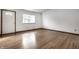 Spacious living room featuring hardwood floors and lots of natural light at 8016 Minlo Dr, Indianapolis, IN 46227
