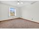 Bright bedroom with neutral walls and carpet flooring at 110 Sterling Dr # 5, Pittsboro, IN 46167