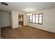 Dining area with hardwood floors and view into kitchen at 110 Sterling Dr # 5, Pittsboro, IN 46167