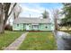 Charming ranch home with a freshly painted exterior and a spacious lawn at 1110 N 15Th St, Noblesville, IN 46060