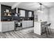 Modern kitchen with gray cabinets, wood countertops, and stainless steel appliances at 1467 S Illinois St, Indianapolis, IN 46225