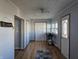 Welcoming entryway with wood-look flooring and a door with a decorative glass insert at 1517 N E St, Elwood, IN 46036