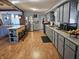 Spacious kitchen with gray cabinetry, stainless steel appliances, and ample counter space at 1517 N E St, Elwood, IN 46036