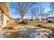 Large backyard with a patio and storage shed at 3019 E 7Th St, Anderson, IN 46012