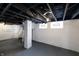 Unfinished basement with exposed brick and water heater at 3307 Central Ave, Indianapolis, IN 46205