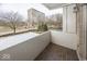 Private balcony overlooking a tree-lined street at 3965 N Meridian St # Apt 2A, Indianapolis, IN 46208