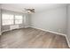 Spacious bedroom with large windows and ceiling fan at 3965 N Meridian St # Apt 2A, Indianapolis, IN 46208