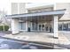 Modern building entrance with covered walkway and stylish design at 3965 N Meridian St # Apt 2A, Indianapolis, IN 46208
