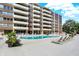 Inviting kidney-shaped swimming pool with surrounding lounge chairs at 3965 N Meridian St # Apt 2A, Indianapolis, IN 46208