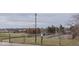 Community tennis courts with surrounding green space at 3965 N Meridian St # Apt 2A, Indianapolis, IN 46208