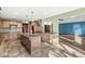 Island kitchen with granite countertops and stainless steel appliances at 6337 Red Oak Dr, Avon, IN 46123