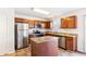 Modern kitchen with granite countertops and island at 6415 Kelsey Dr, Indianapolis, IN 46268