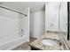 Clean bathroom with granite countertop and bathtub at 8442 Burket Way, Camby, IN 46113