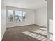 Spacious bedroom with neutral carpeting and large windows at 8442 Burket Way, Camby, IN 46113
