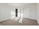 Bright bedroom with neutral carpeting and window at 8442 Burket Way, Camby, IN 46113