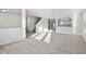 Sunlit living room with carpeted floor and an open floor plan at 8442 Burket Way, Camby, IN 46113