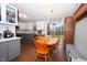 Bright dining area with wood table and chairs near kitchen at 8523 Farmhill Rd, Indianapolis, IN 46231