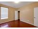 Well-lit bedroom with hardwood floors and closet at 12997 Bartlett Dr, Fishers, IN 46037