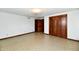 Good sized bedroom with wood closet and tile floor at 1500 S Anderson St, Elwood, IN 46036