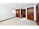 Bright bedroom with neutral walls and carpet at 1500 S Anderson St, Elwood, IN 46036