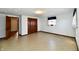 Simple bedroom with tile floor and wood closet at 1500 S Anderson St, Elwood, IN 46036