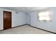 Simple bedroom with light blue walls and carpet at 1500 S Anderson St, Elwood, IN 46036