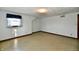 Bright bedroom featuring a window and carpet flooring at 1500 S Anderson St, Elwood, IN 46036